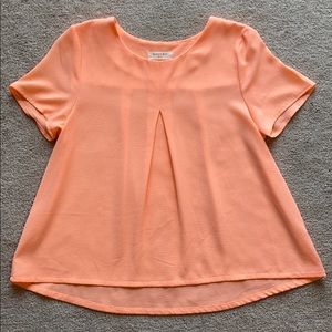 Tangerine short sleeve swing top